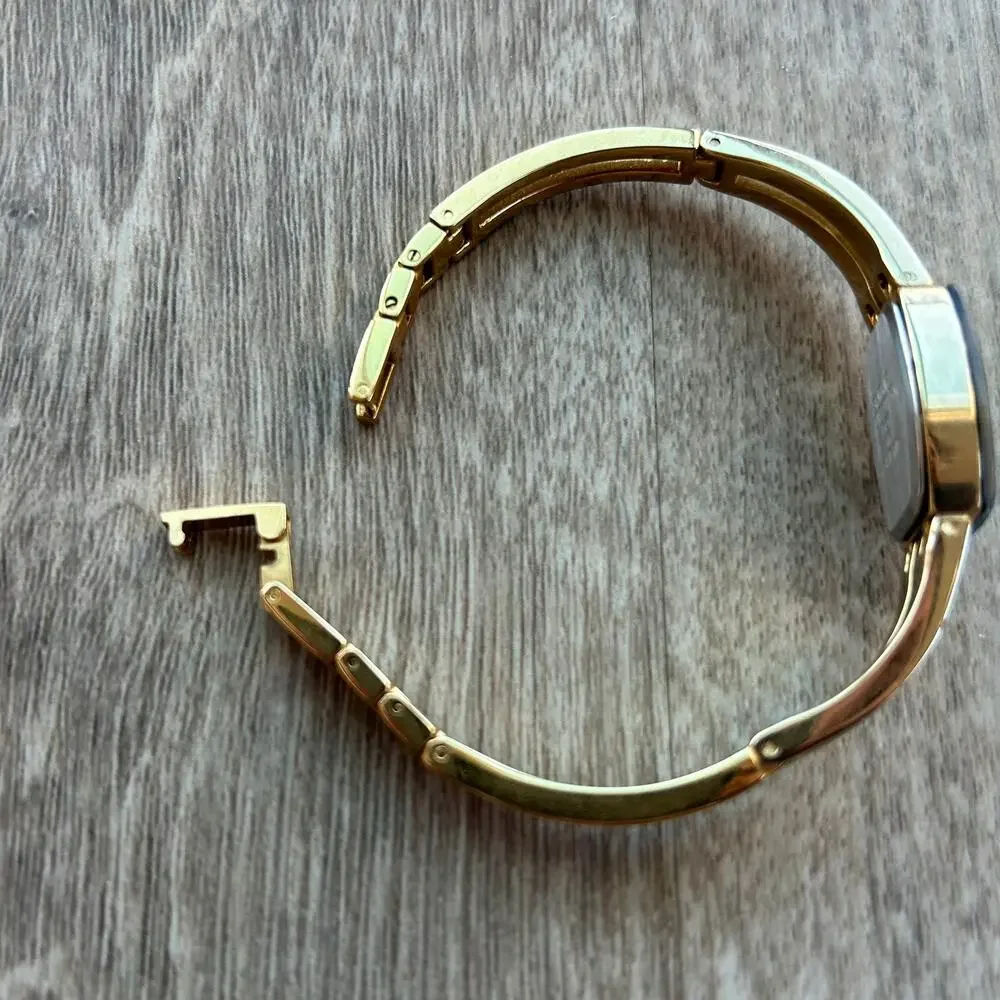 Armitron Diamond Now Blue Dial Gold Tone Bangle Watch